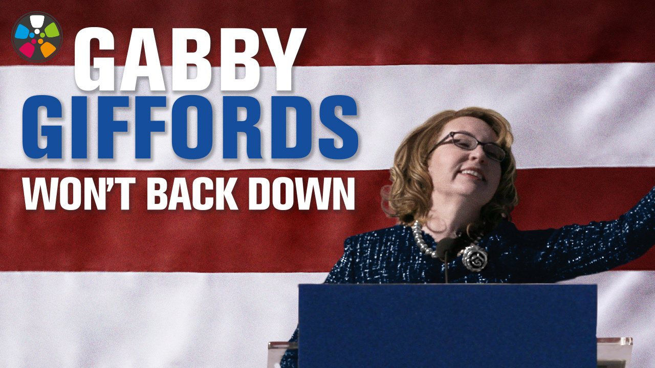 Movie poster for Gabby Giffords Won't Back Down featuring Gabby, a white woman in her 50s, at a podium speaking