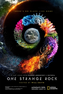 Poster for One Strange Rock, showing planet Earth at the center of an helix made of different colorful natural elements the unfurls outward into space.