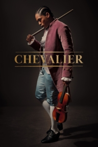 Detail from the film poster for Chevalier, showing the title character, Joseph de Bologne, Chevalier de Saints-George, a Black French courtier. He wears a plum colored 18th century French jacket over a brocade vest and ruffled shirt, and holds a violin.