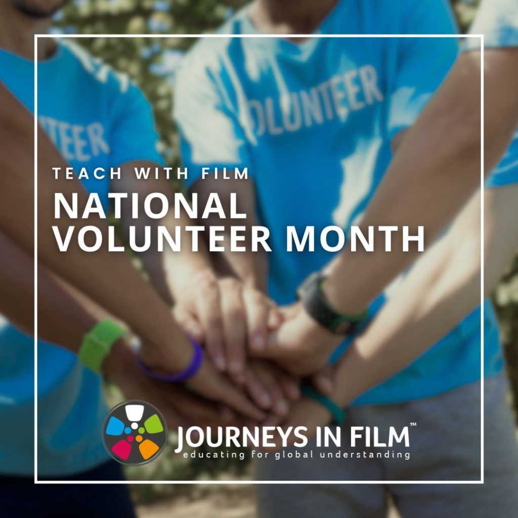 Volunteers in blue t-shirts stack their hands together. Text says: "Teach With Film: National Volunteer Month."
