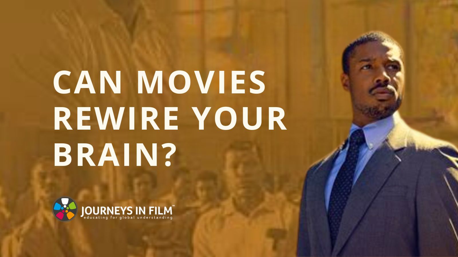 Actor Michael B. Jordan stands in 3/4 profile, looking resolute, as real life lawyer Bryan Stevenson in the film Just Mercy. Text says: Can Movies Rewire Your Brain?