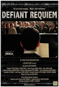 The film poster for Defiant Requiem, showing from behind a man seated at a piano, facing a standing group of singers. Barbed wire runs across the top over sheet music, followed by text that says: Art was their weapon. Music, their resistance. Defiant Requiem."